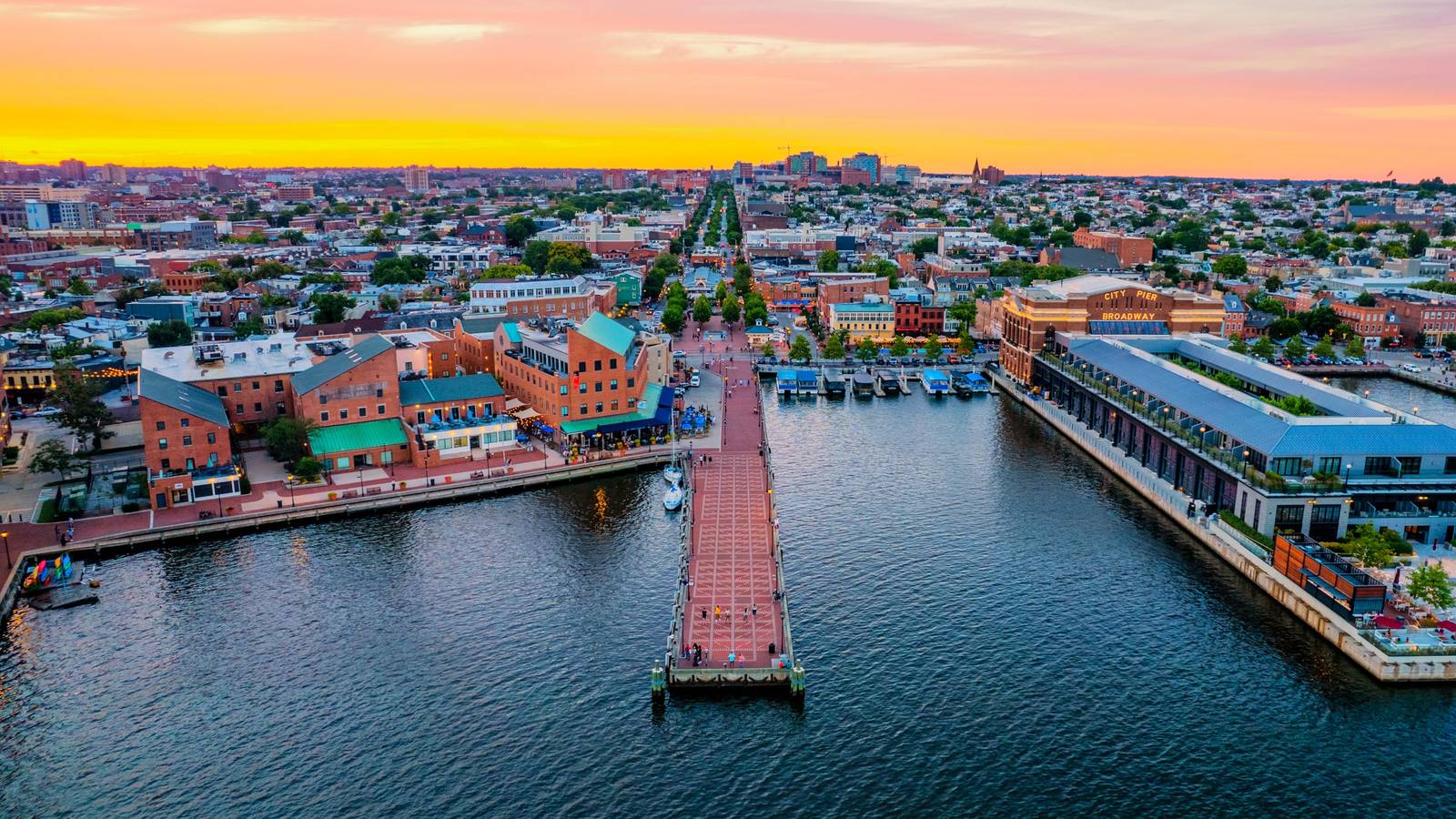 Fell's Point and the Broadway Pier in Baltimore from the air at dusk